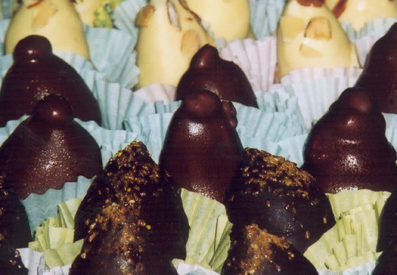 Dark and white chocolate truffles in paper cups at Chocolate on Pacific Avenue