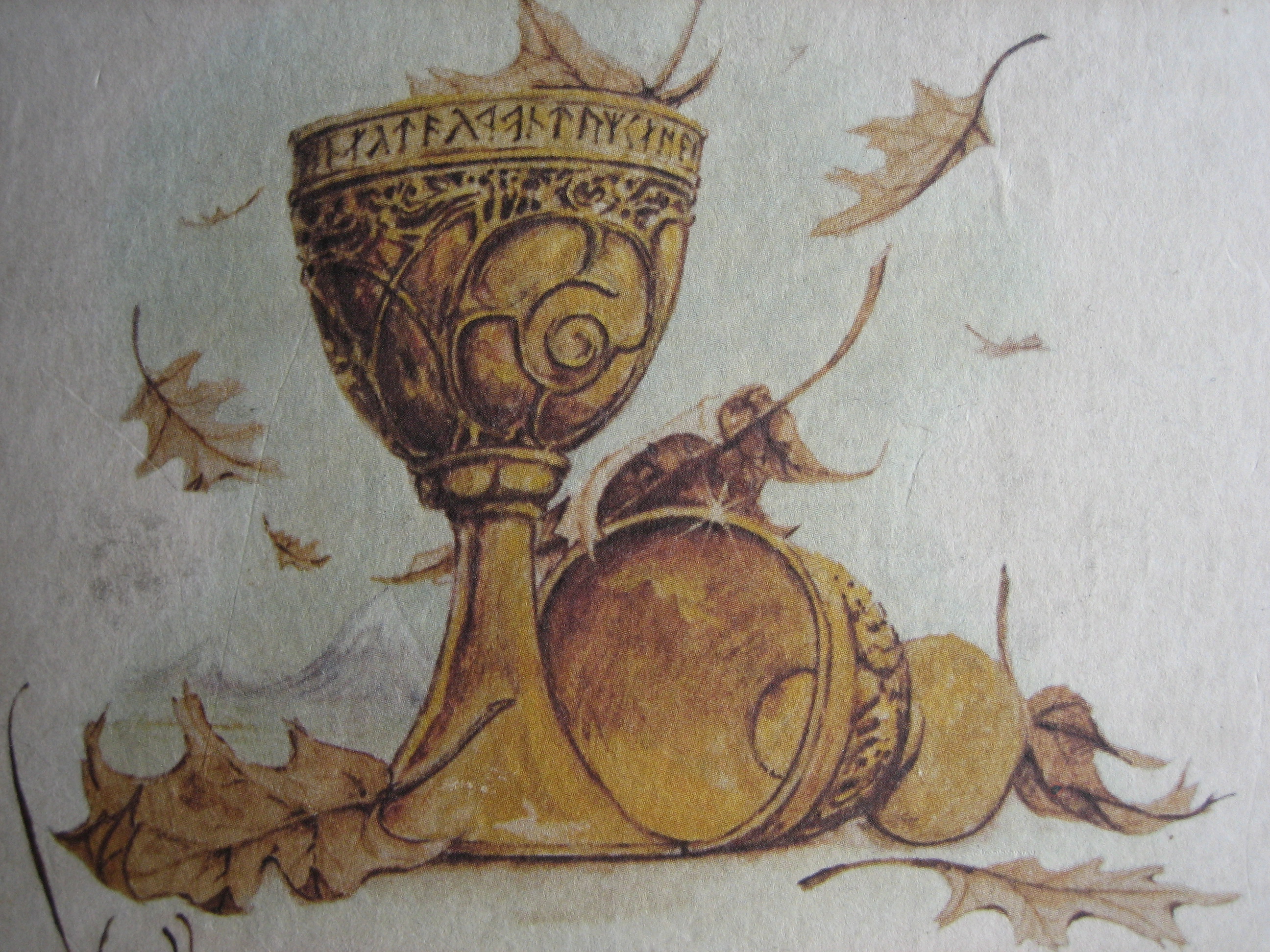 Illustration of a decorated Celtic chalice surrounded by autumn leaves